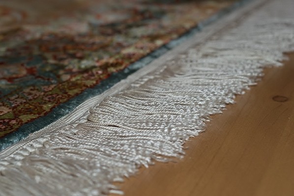 Naprawa frędzli dywanu