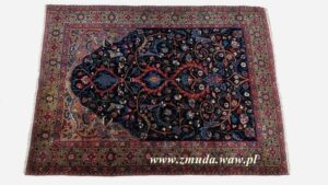 Stuletni dywan perski po obszyciu i zabezpieczeniu frędzli